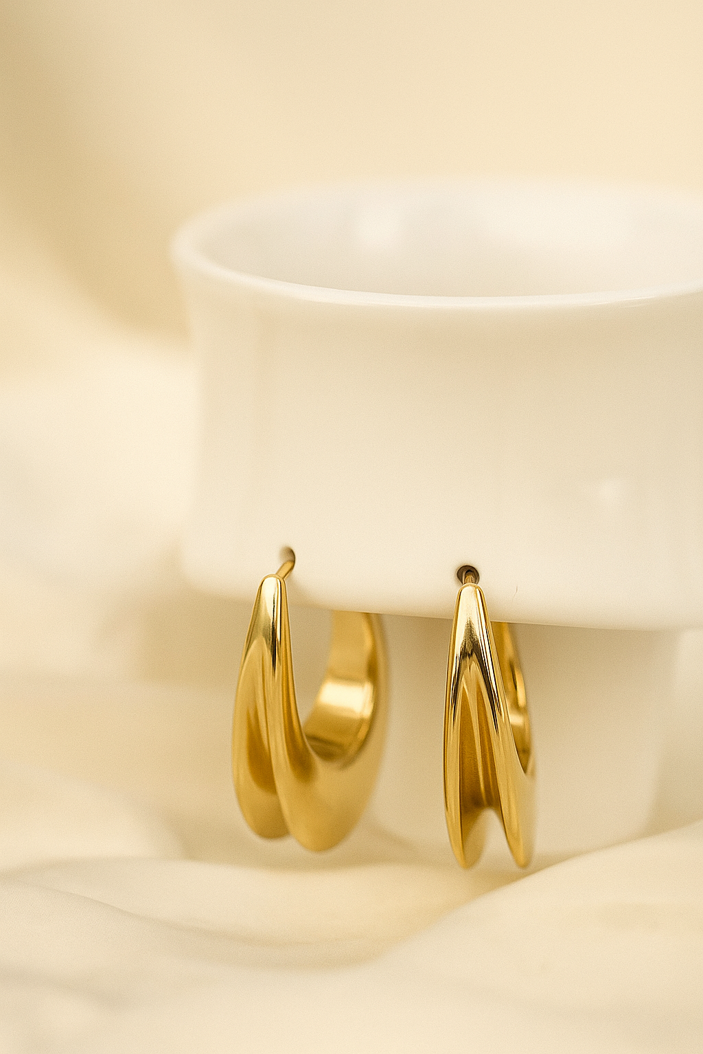 Golden Oval Huggie Hoops